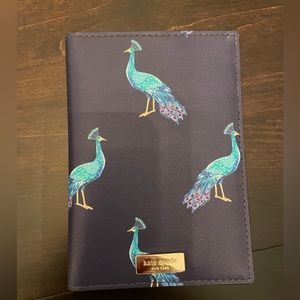Kate Spade Passport Case/Holder with room for credit cards.